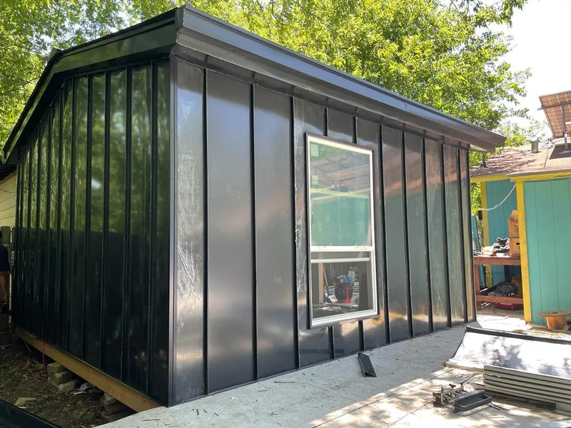 Black standing seam metal wall panels for Roof Inspection in Utica